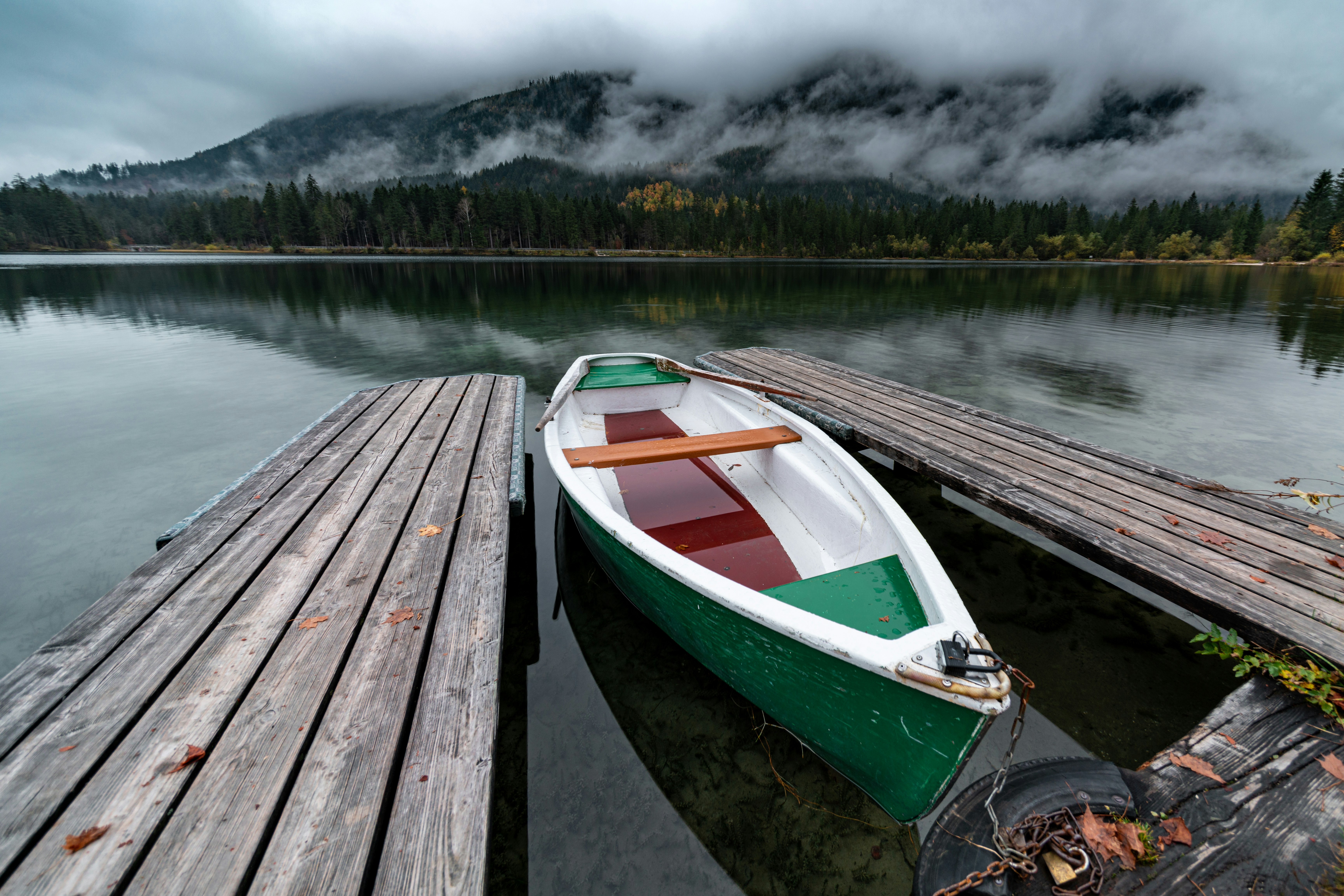 brown wooden dock on lake during daytime